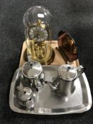 A tray of three piece steel tea service on tray, Art Deco style mirrored mantle clock,