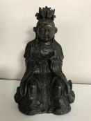 A bronze figure of an Eastern deity CONDITION REPORT: Good condition. Modern.