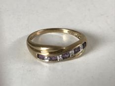 A 9ct gold amethyst and diamond ring