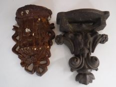 Two antique cast iron wall sconces