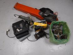 A dismantled Teagle cycle motor, car engine diagnostic equipment, compressor tester, tachometer,