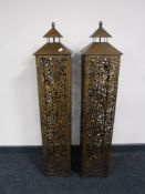 Two contemporary metal tea light holders