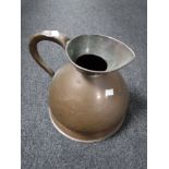 A 19th century copper two gallon jug