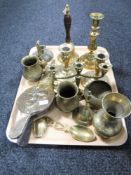 A tray of brass ware, candlesticks, bellows,