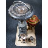 A tray of smoker's stand in the form of a stove, decorative red and gilt samovar,