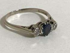 An 18ct gold sapphire and diamond ring