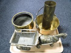 A tray of brass ammunition shell and jam pan,