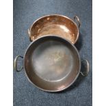 Two copper twin handled cooking pots