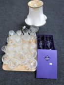 A tray containing assorted crystal drinking glasses,