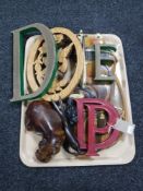 A tray of cast iron and wooden hand painted letters,