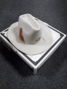 A boxed Rockmount cowboy style hat in Stetson box