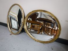 Two oval gilt framed mirrors