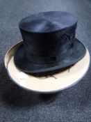 A silk formal hat in box by Pragner CONDITION REPORT: Size 5 1/2