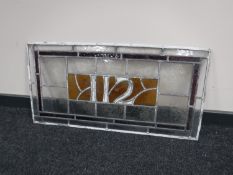 An unframed leaded stained glass window