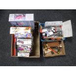 Three boxes of assorted plastic modelling kits, model cannons and parts,