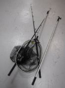 Two boat fishing rods, reel, landing net, fish and boat hook,