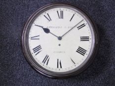 A mahogany cased circular wall clock with chain-driven single fusee movement,