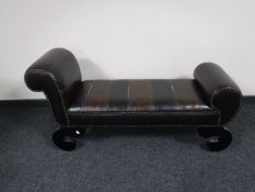 A leather upholstered chaise longue
