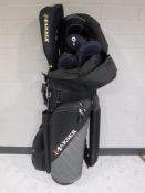 A set of Masker irons and drivers, eleven golf clubs in total,