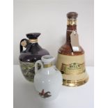 A Bells Wade Old Scotch Whisky decanter 75cl (sealed) and two Rutherford Deluxe Scotch Whisky