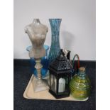 A tray of contemporary vases, hurricane lamp,