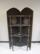 An antique hand painted four tier corner what not stand and a folding tapestry screen