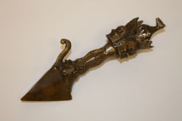An eastern bronze phurba, length 18 cm.