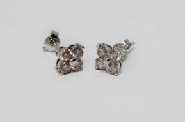 A pair of 18ct white gold diamond earrings