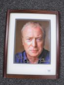 A signed photograph of Sir Michael Caine,