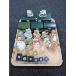 A tray of five boxed Liliput Lane houses, six Liliput Lane collector's badges,