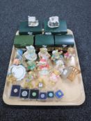 A tray of five boxed Liliput Lane houses, six Liliput Lane collector's badges,