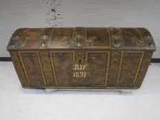 A 19th century hand painted shipping trunk with metal mounts