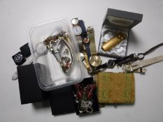A collection of assorted wrist watches, costume jewellery, boxed lighter,