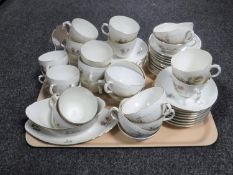 An extensive Royal Copenhagen tea and dinner service (on three trays)