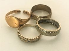 Four 9ct gold rings,