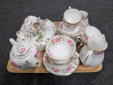 A tray containing twenty-pieces of Royal Worcester Royal Garden tea china together with a three