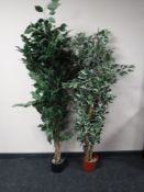 Two artificial trees in pots