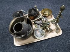 A tray of assorted metal ware - pair of brass fire dogs, cooking pot, measures,
