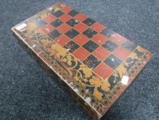 A chess board in the form of a book