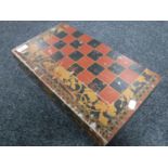 A chess board in the form of a book