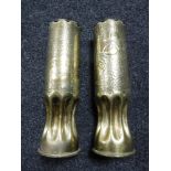 A pair of brass ammunition trench art shells