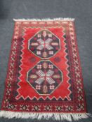 A bokhara design rug,