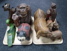 Two trays of wooden carvings, animals,