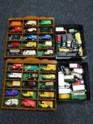 Two boxes and two display cases of die cast advertising vehicles