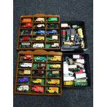Two boxes and two display cases of die cast advertising vehicles