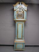 A continental painted and gilt longcase clock with pendulum and weights