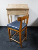 A pine clerk's desk and a chair