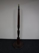 An antique mahogany standard lamp base