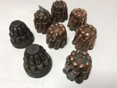 A set of six Victorian copper miniature jelly moulds, diameter approximately 57mm,