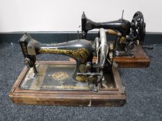 Two Singer hand sewing machines (one in case)
